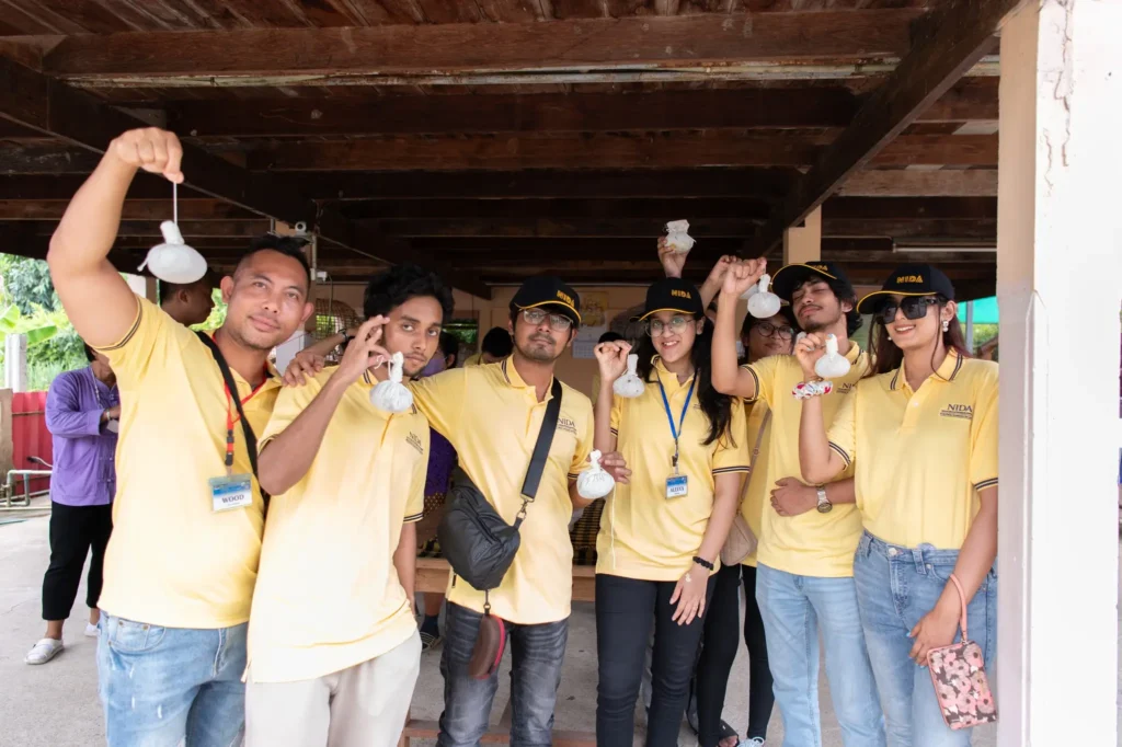 NIDA 9th International Summer Camp 2023: การศึกษาดูงานโรงพยาบาลบ้านแพ้ว และชุมชนเกาะเกิด